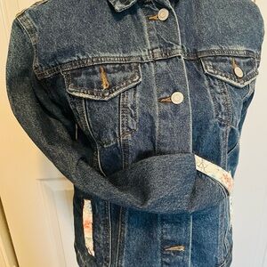 Thrifted jeans jacket decorated to be  again.